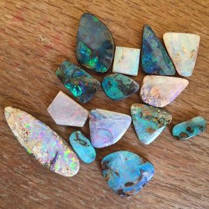 assortment of Australian opals on a table