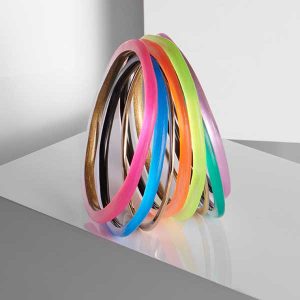 Alexis Bittar neon bracelet stack