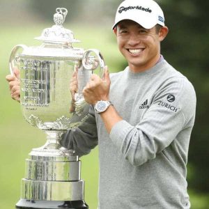 Collin Morikawa with PGA trophy