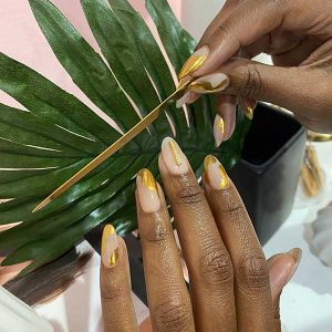 Julie K gold embellished manicure