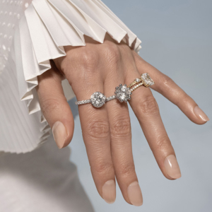 Oscar Massin engagement rings on model