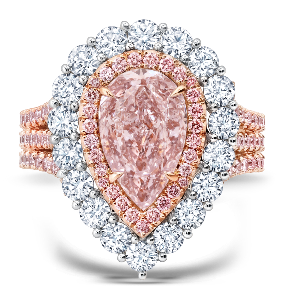 Platinum and 18k rose gold ring with pear modified brilliant light brown-pink center diamond, round brilliant colorless diamonds, and round brilliant fancy pink diamonds.